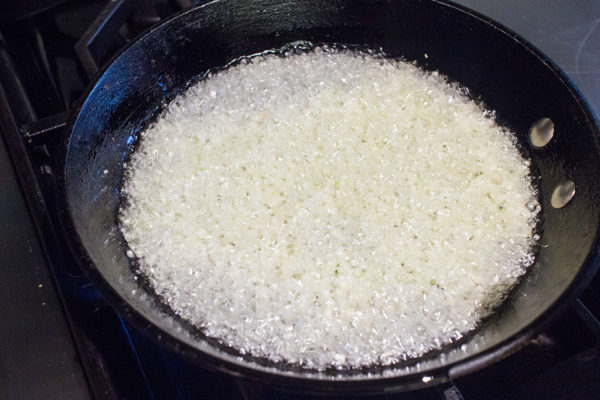 Add-garlic-to-hot-oil